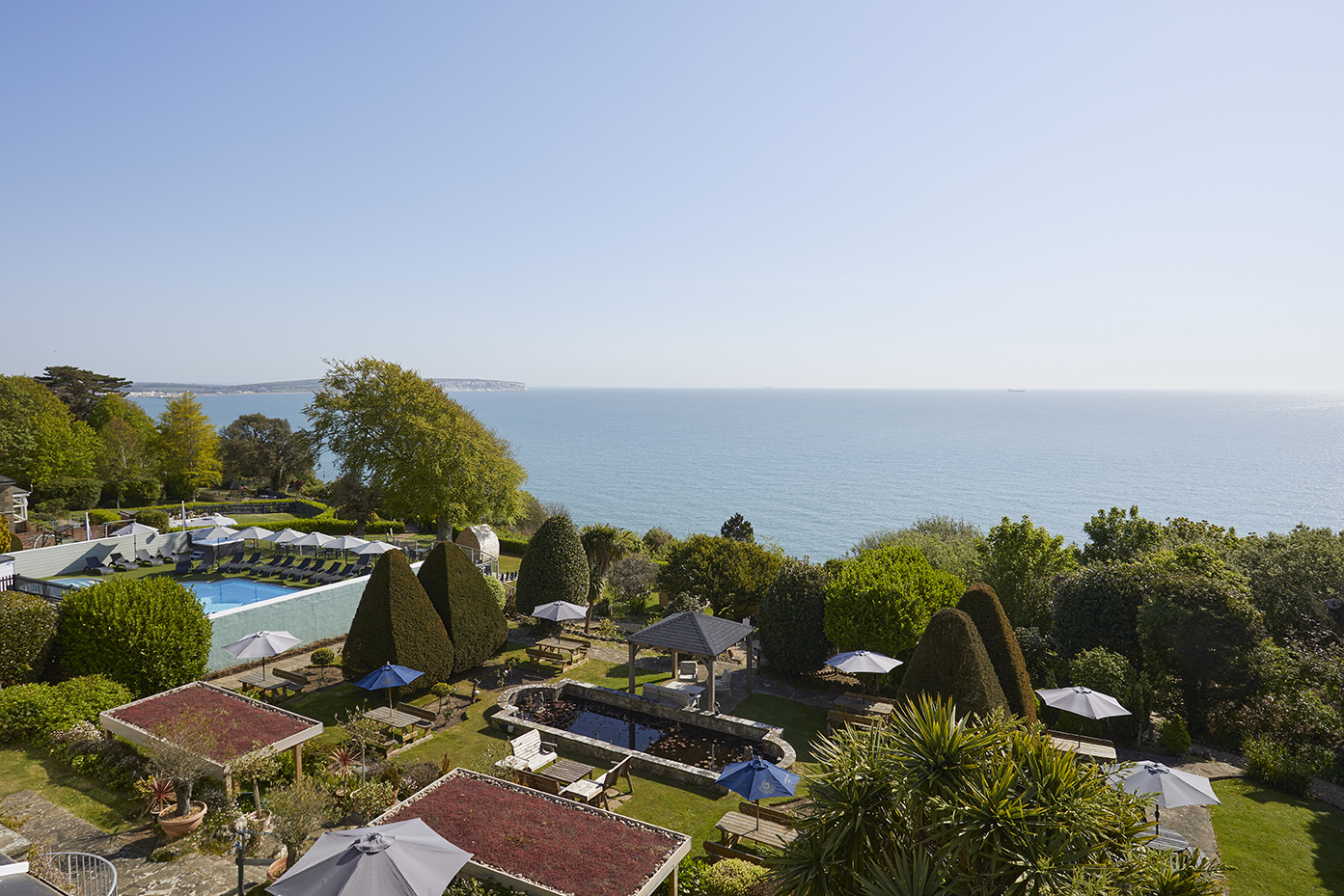 The view over Luccombe Hall's gardens to Sandown Bay